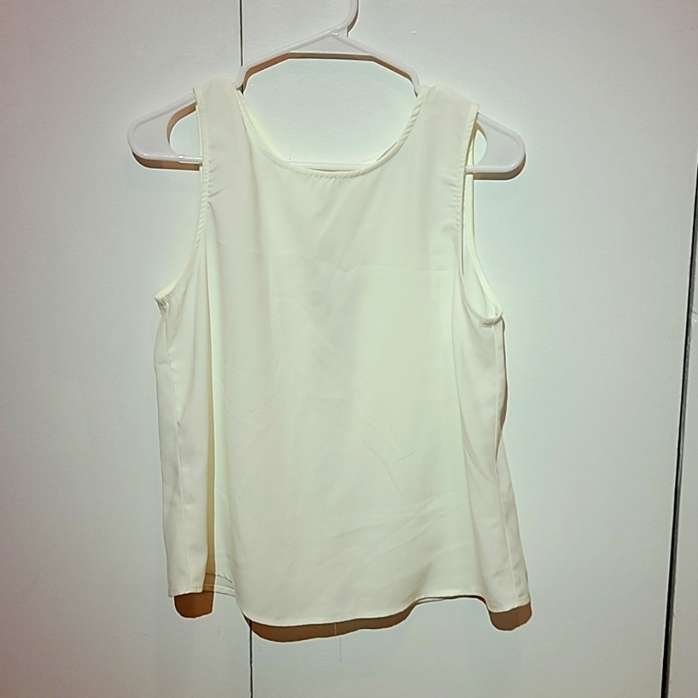 White tank top, opened line in back